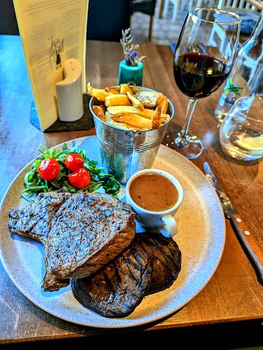 Steak with peppercorn sauce at The Peppermill